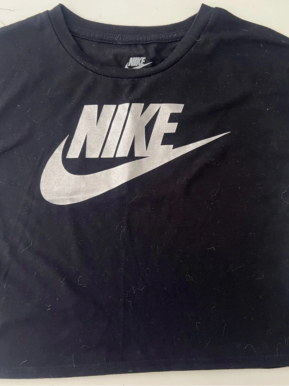 Girls cropped Nike Black Crop Tee with Silver Logo